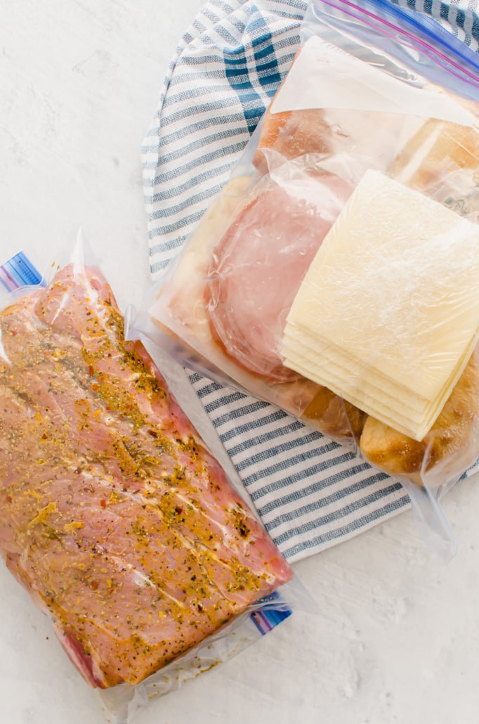ingredients for Cuban Pulled Pork paninis in freezer bags to make a freezer meal kit
