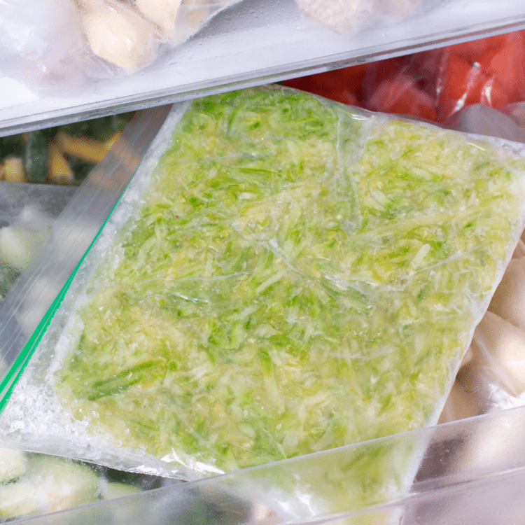 shredded zucchini in a freezer bag