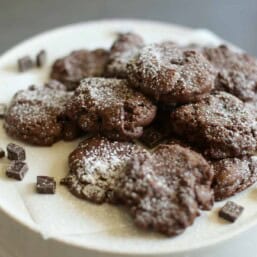 Dark chocolate coffee cookies on a plate to serve.