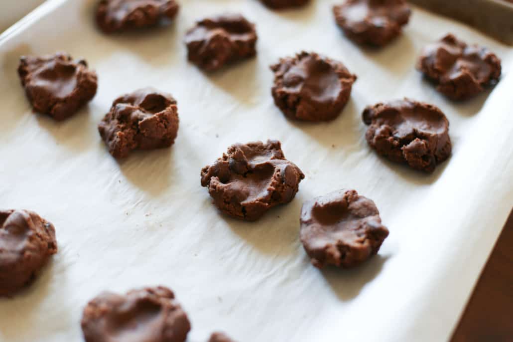 Dark chocolate coffee cookie dough on a baking sheet