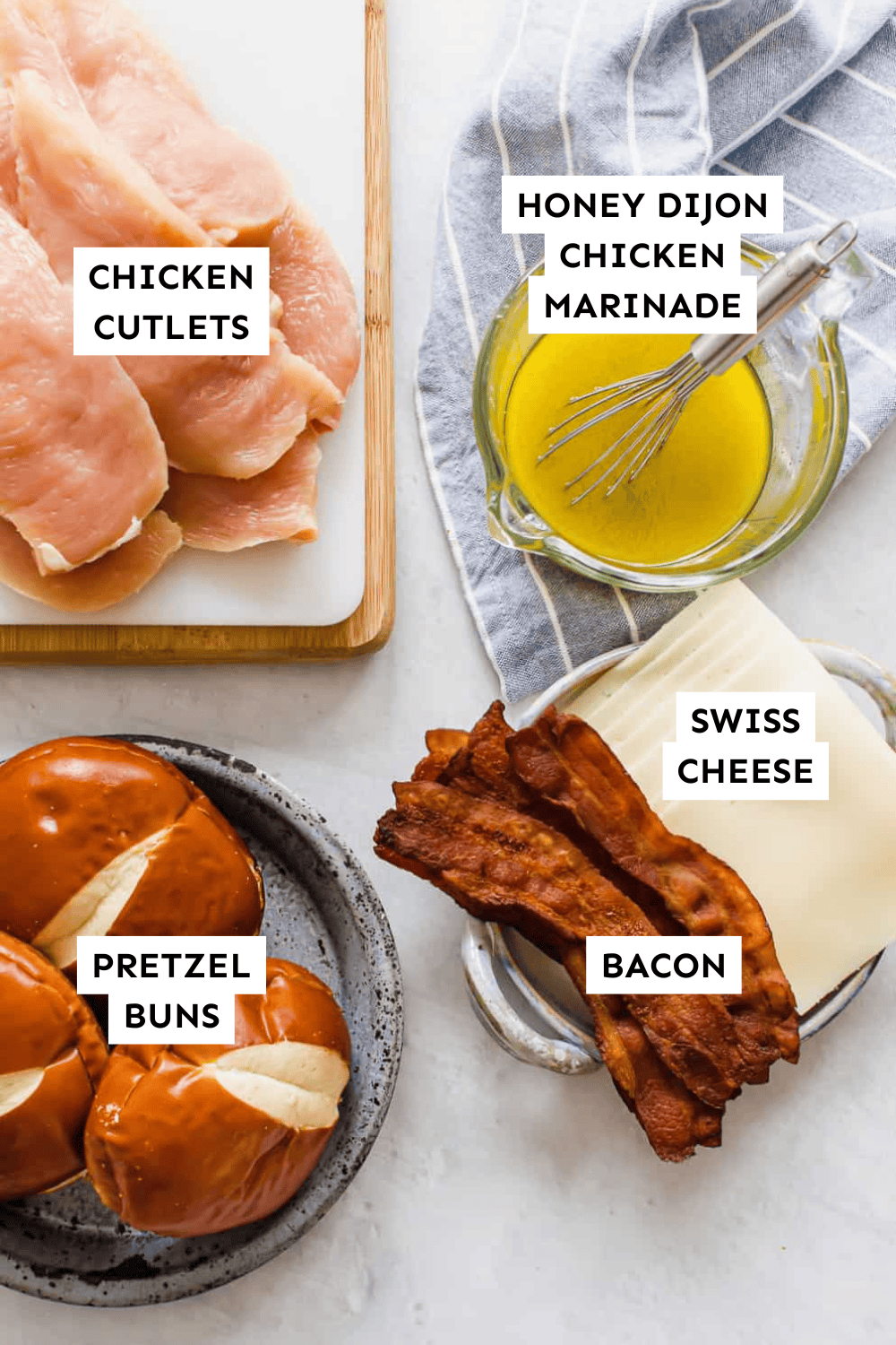 Honey Dijon Chicken Sandwiches ingredients laid out on a counter top and labeled.