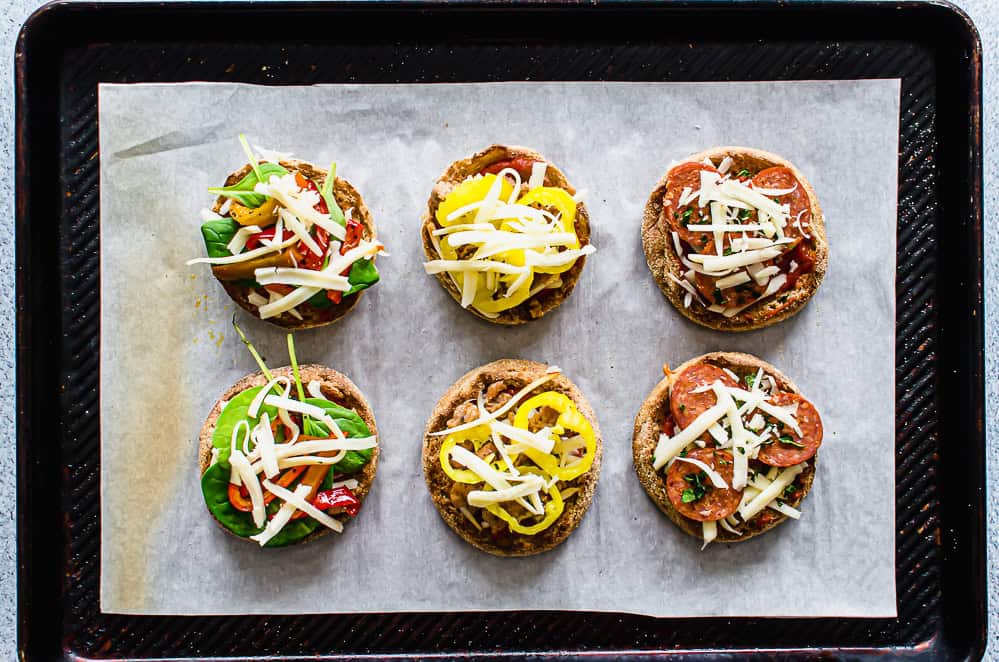 English muffins pizzas before baking.