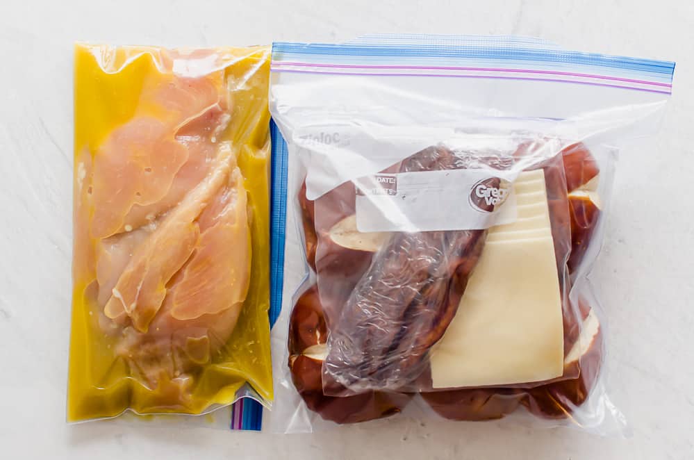 freezer meal with honey dijon chicken and sandwich fixings in freezer bags