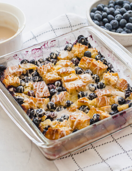 Blueberry French Toast Casserole {with Vanilla Glaze} in a glass casserole dish