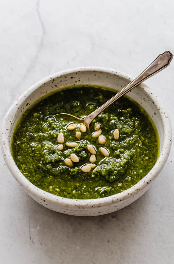 Fresh pesto with pinenuts on top 