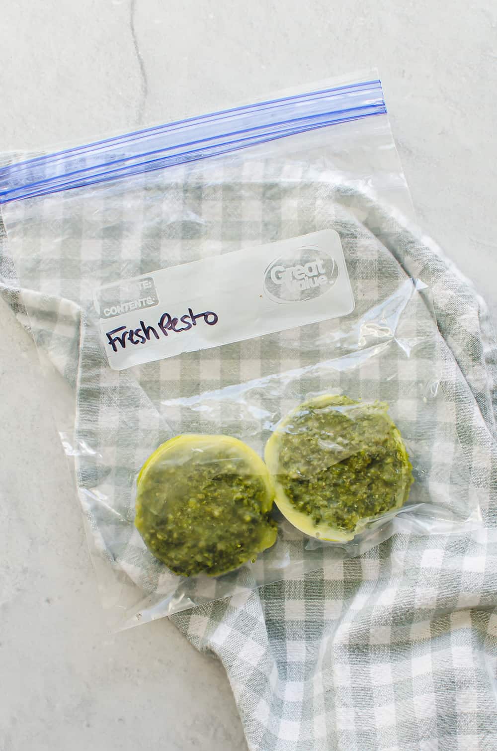 Frozen fresh pesto in a freezer bag.