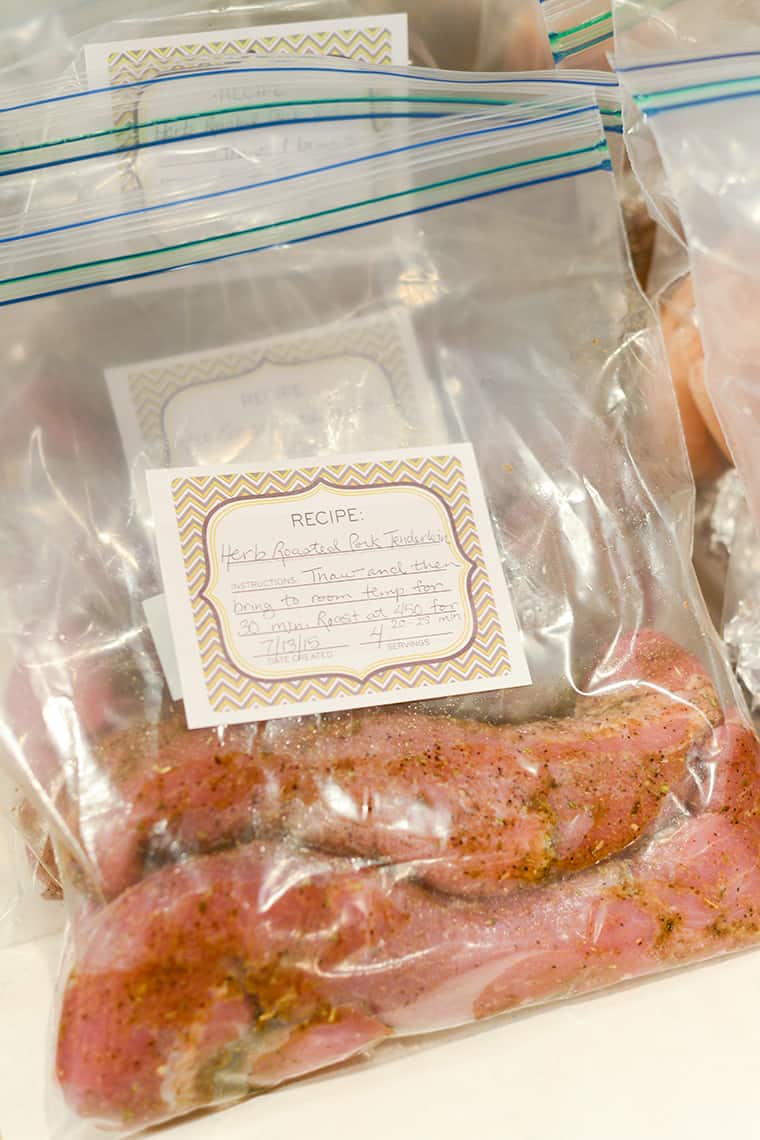Pork tenderloins in a freezer bag, labeled and ready to freeze.