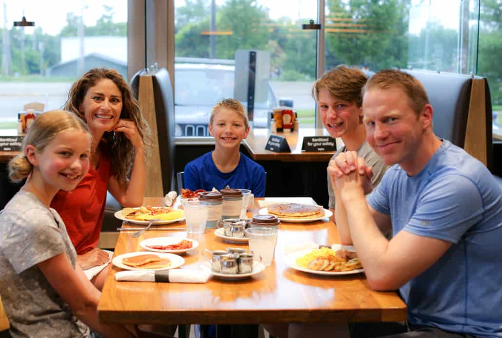 Family at a Hy-Vee eating breakfast