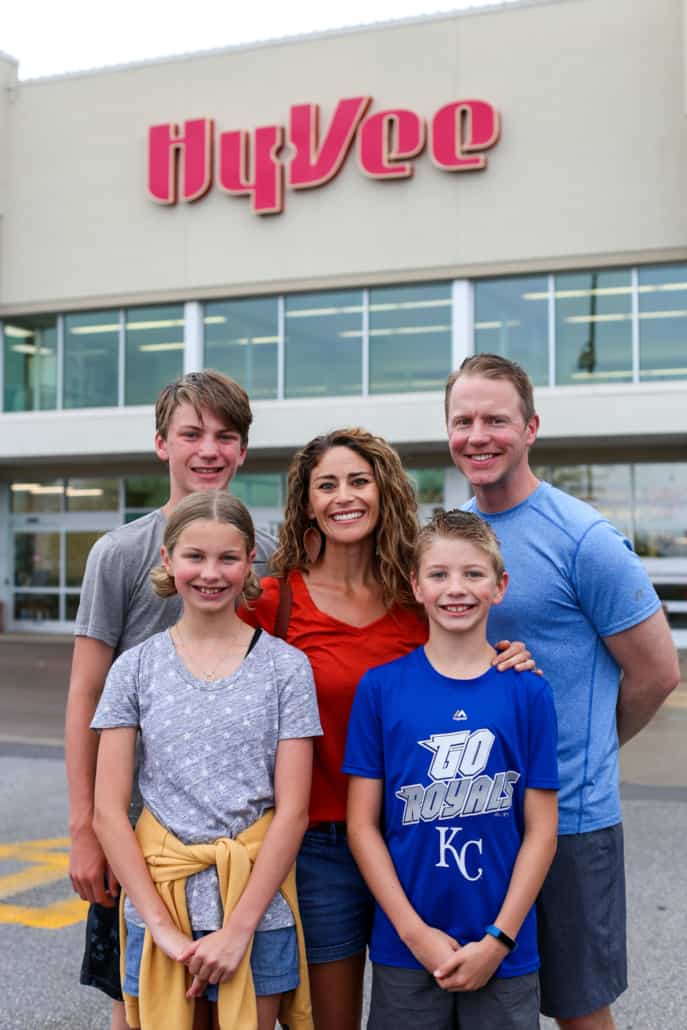 Family standing outside Hy-Vee