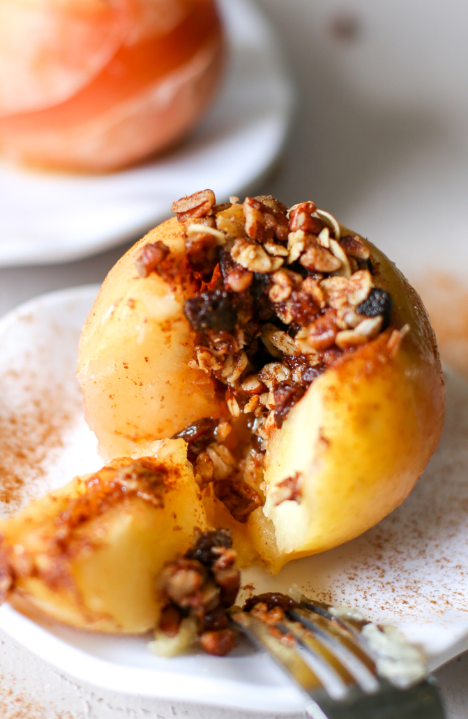 Crockpot Baked Apples sliced open with filling spilling out