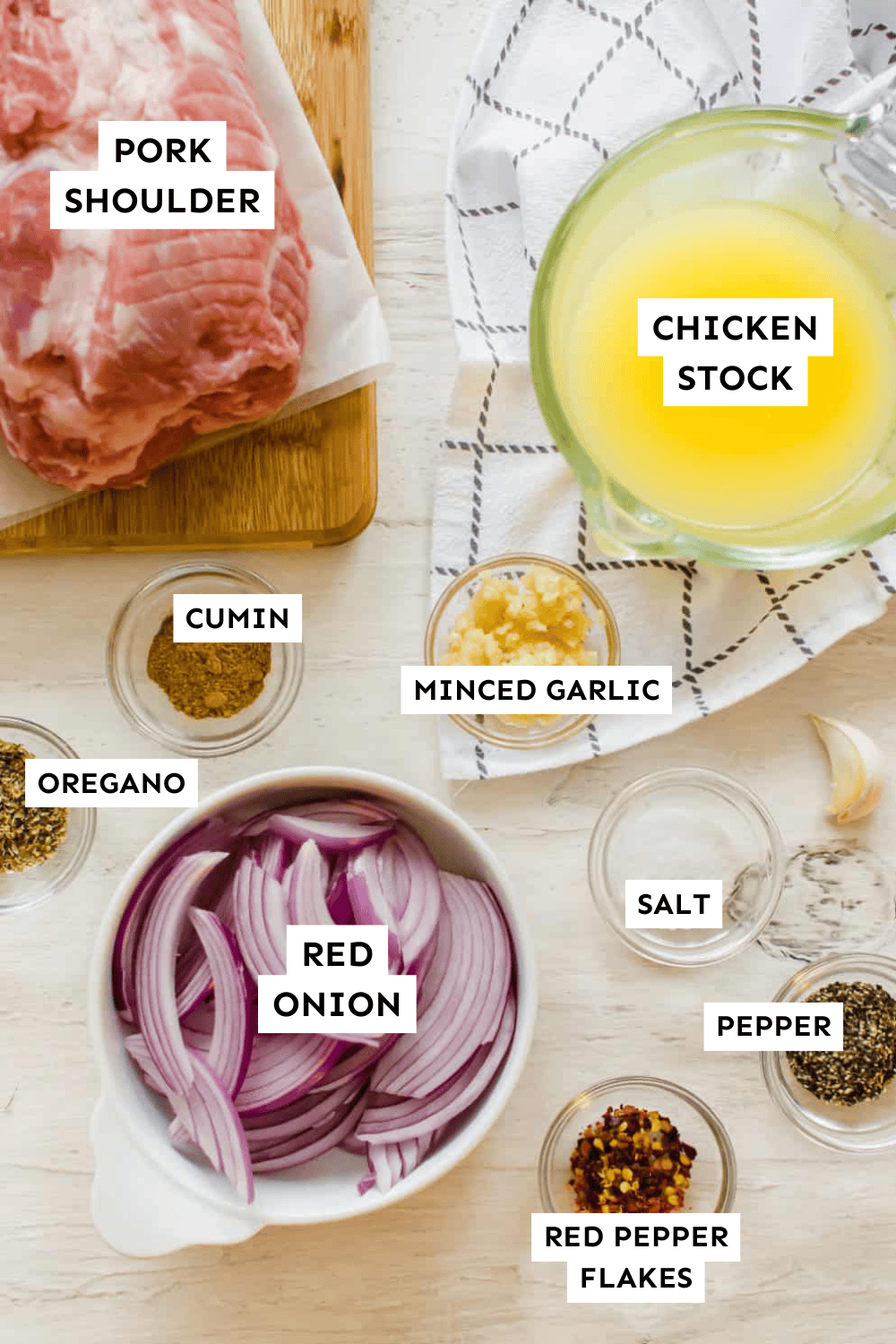 Greek pulled pork ingredients measured out and labeled.