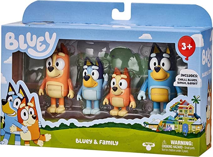 Four Bluey figurines in the original packaging.