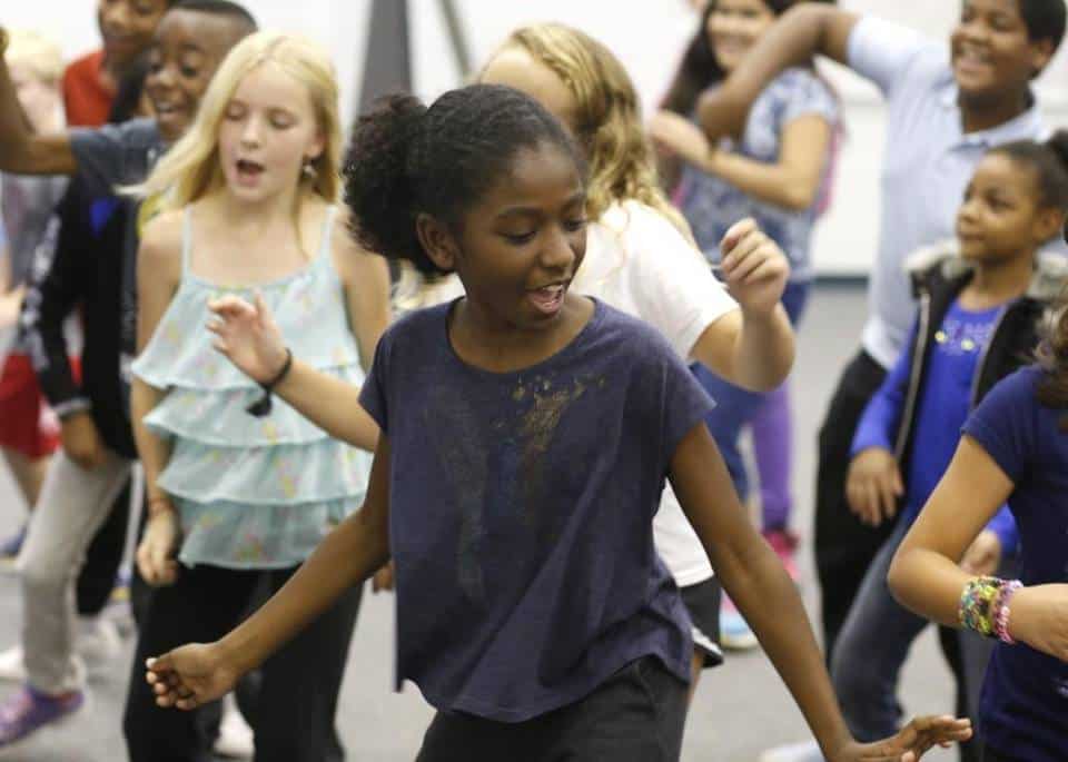 Kids playing Halloween freeze dance.