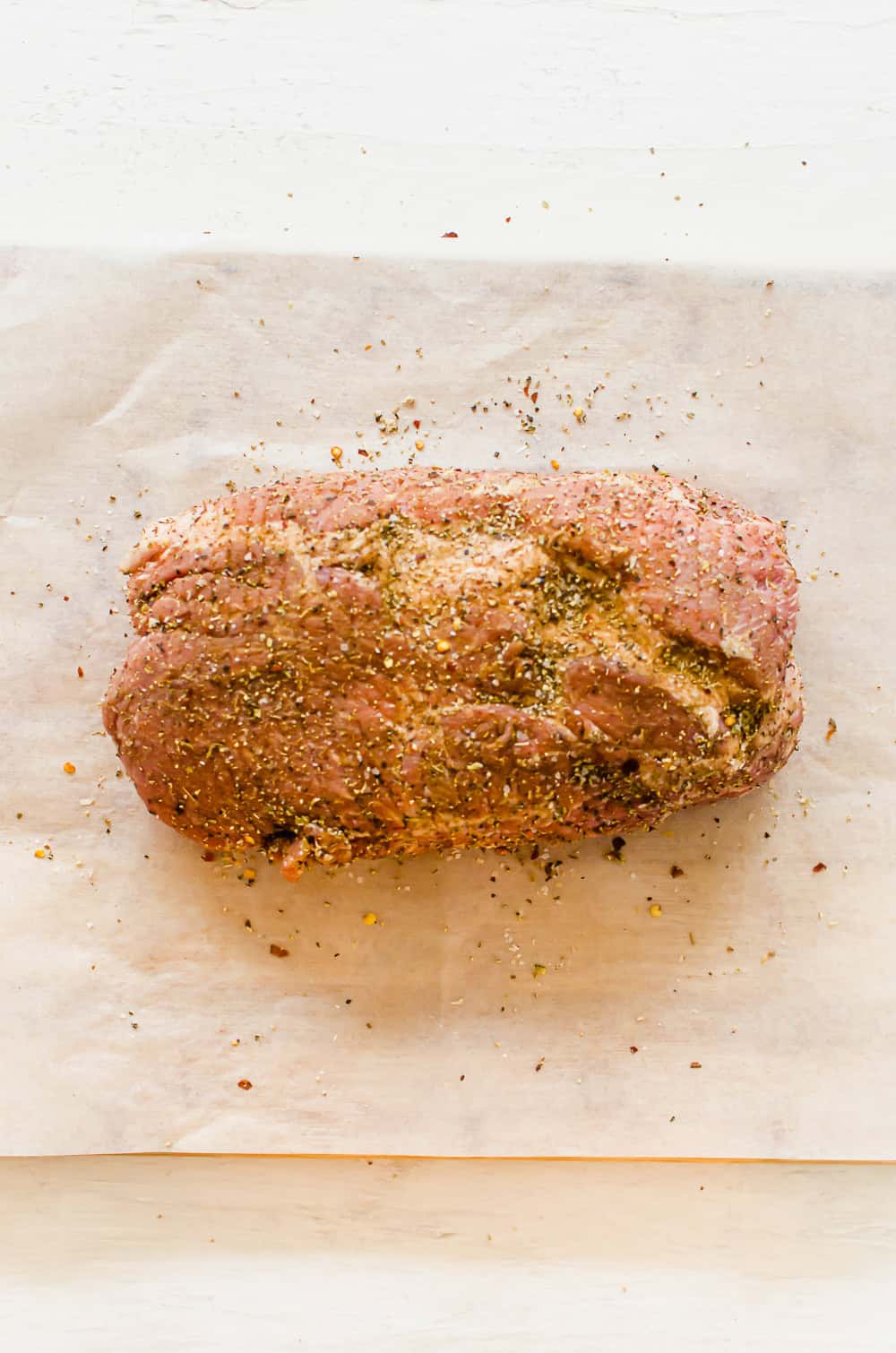 Greek Seasoning coating on a pork shoulder.