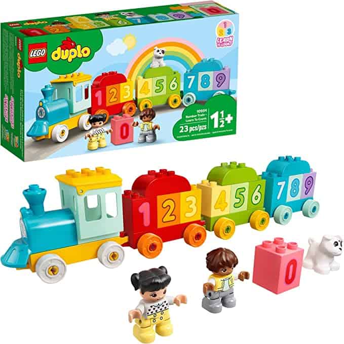 Multi-colored Duplo train set box with the train set up in front of it.