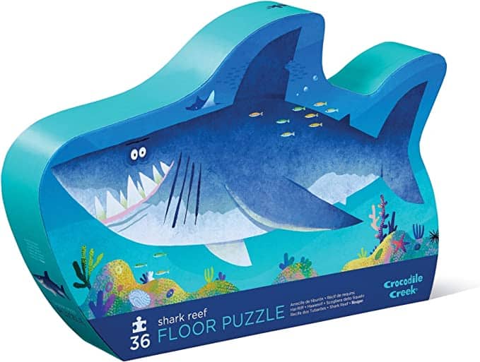 Floor puzzle box in a shark shape because the puzzle is called Shark Reef.