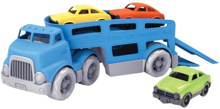 Hard plastic blue semi-truck car carrier with three cars in yellow, orange and green.