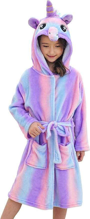 Young child wearing a multi-colored unicorn robe.