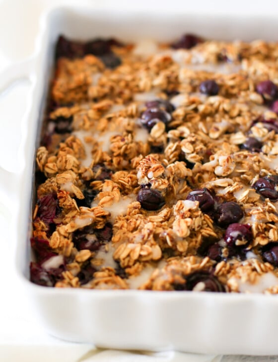 Blueberry baked oatmeal in a white baking dish ready to serve.