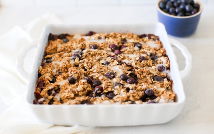Blueberry baked oatmeal in a white baking dish