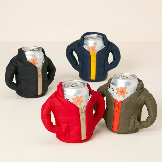 Four cans wearing koozies that look like jackets - in navy with a yellow zipper, black with a tan zipper, olive with an orange zipper, and red with a tan zipper.