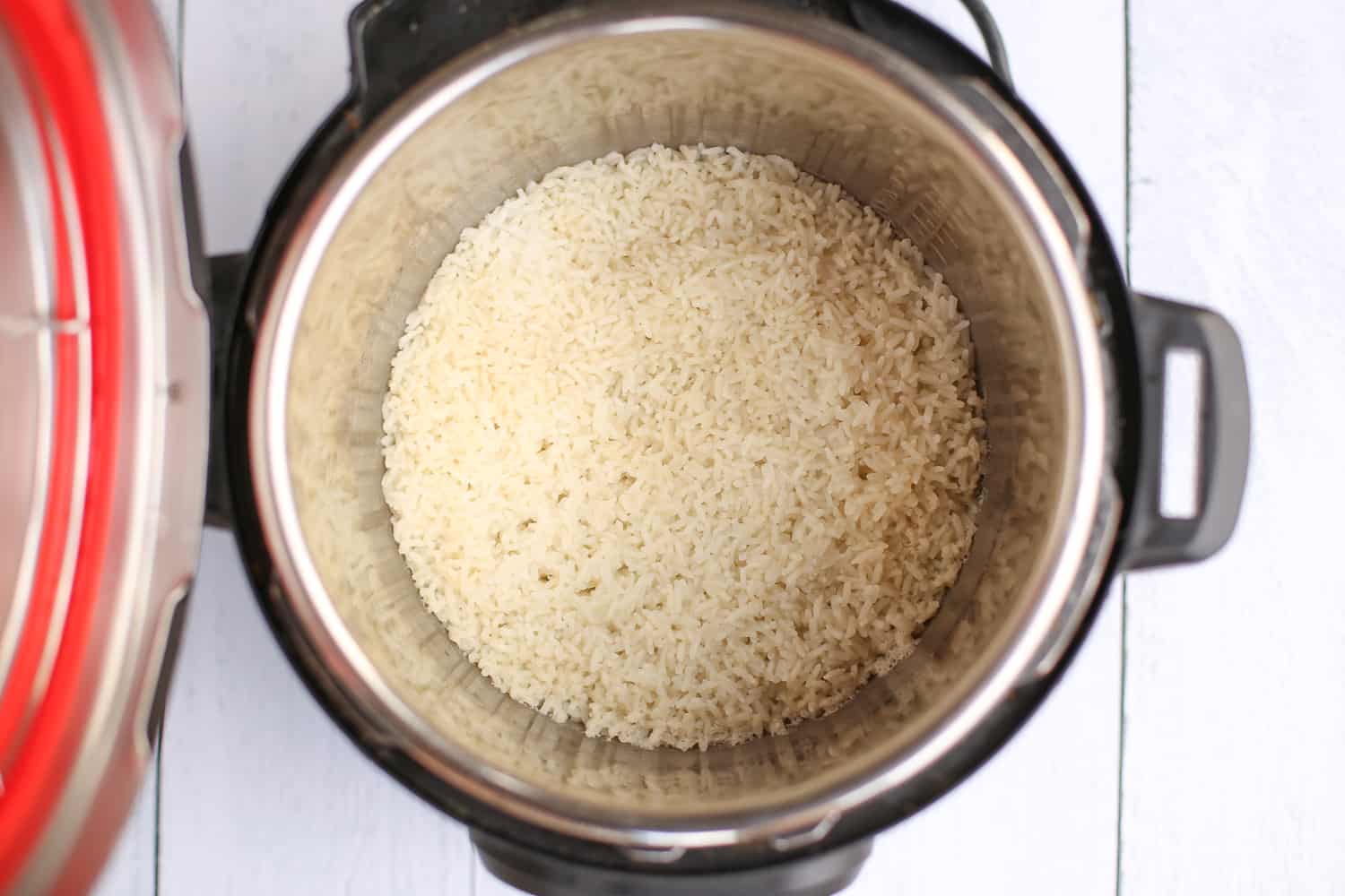 Looking into an Instant Pot of fully cooked white rice.