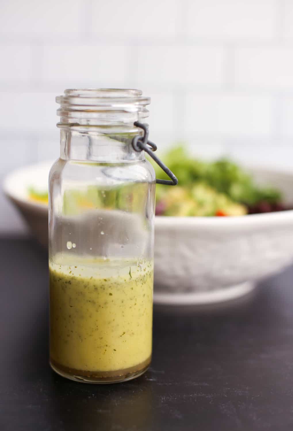 Cilantro Lime Vinaigrette in a tall glass container.