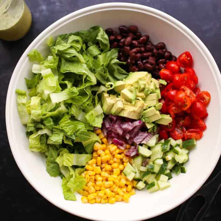 Mexican chopped salad in a white bowl.