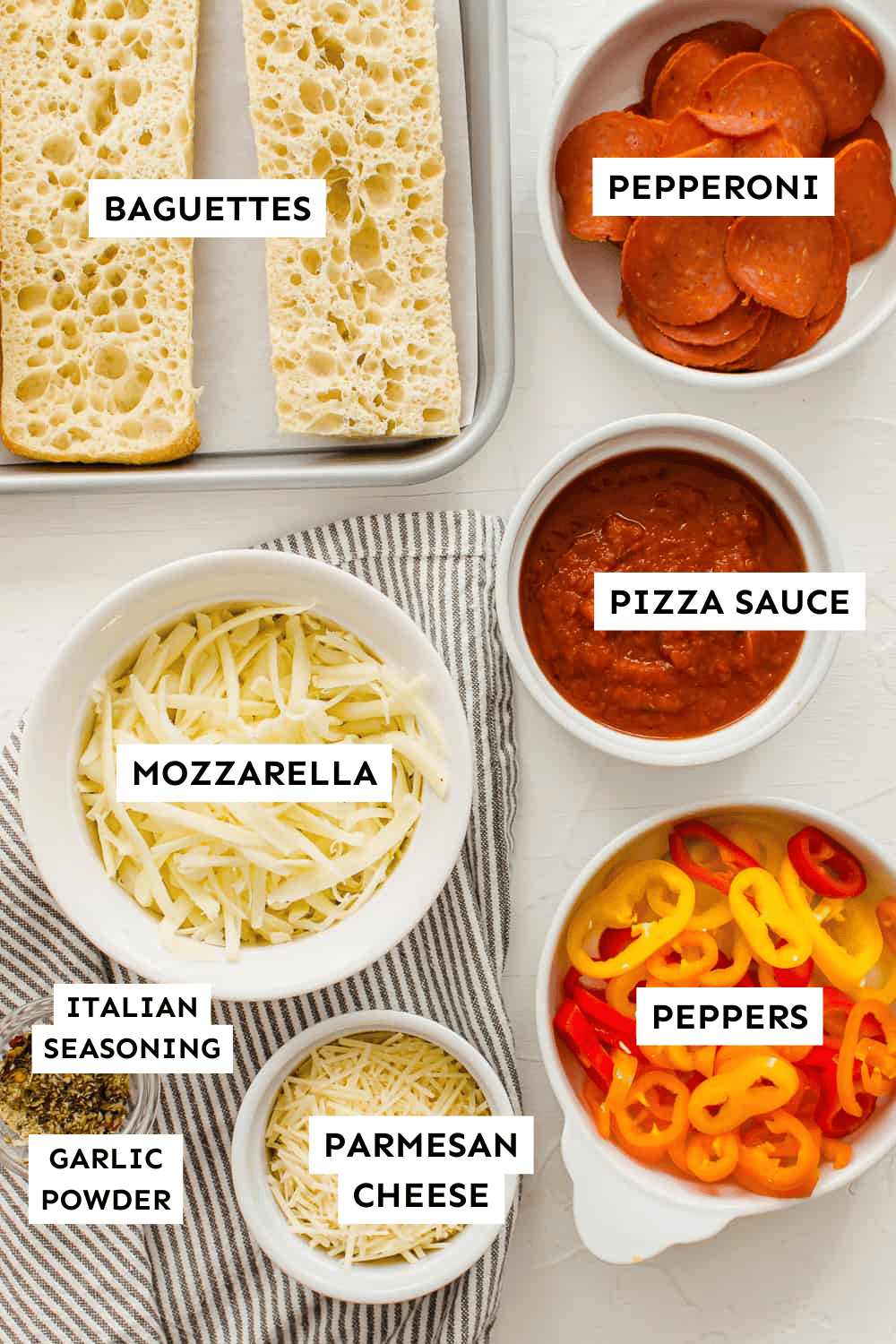 Pizza bread ingredients laid out.