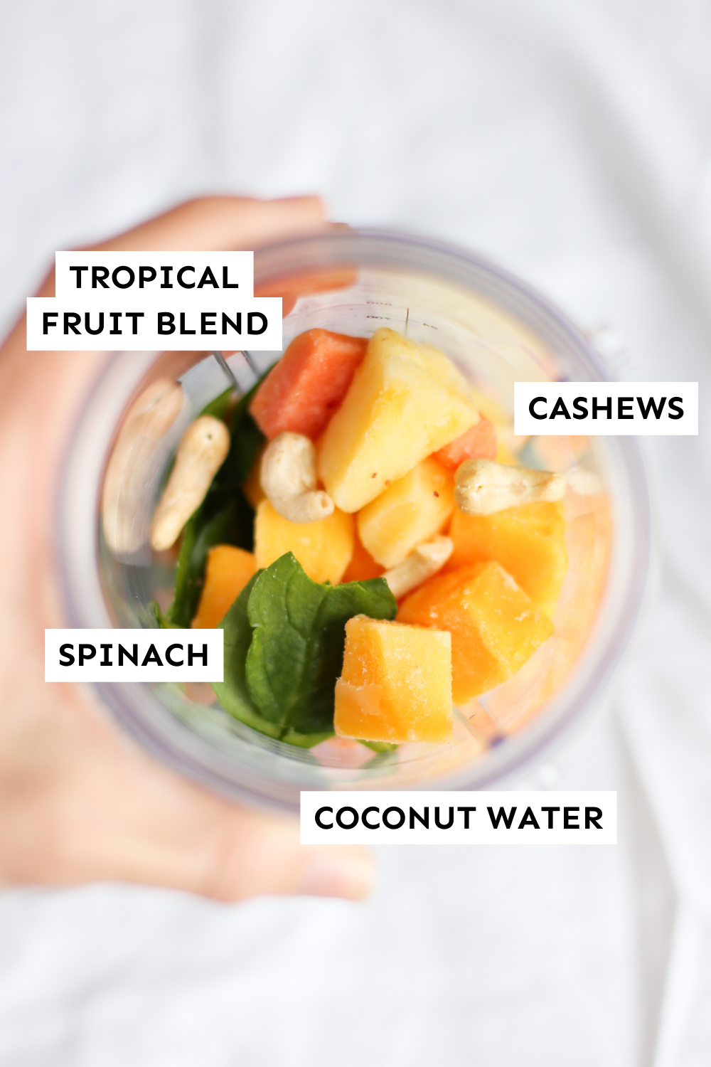 Labeled ingredients for tropical smoothie recipe. 