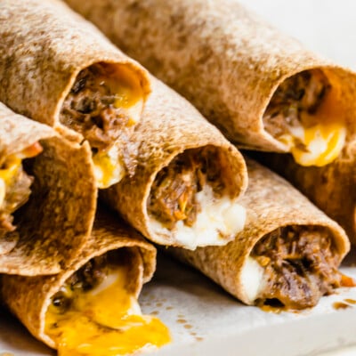 Creamy Chicken Taquitos {Made in the Crock Pot then Baked!}