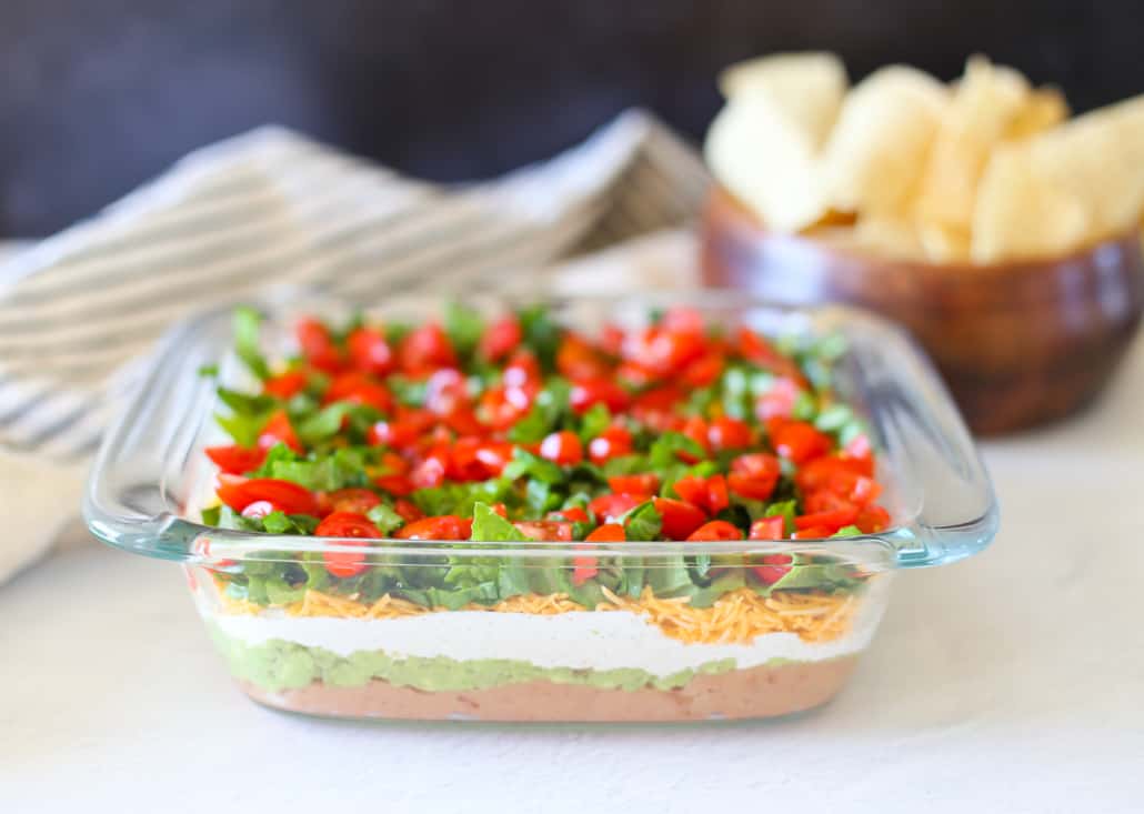 taco layered dip--an appetizer that goes with all kinds of Mexican recipes