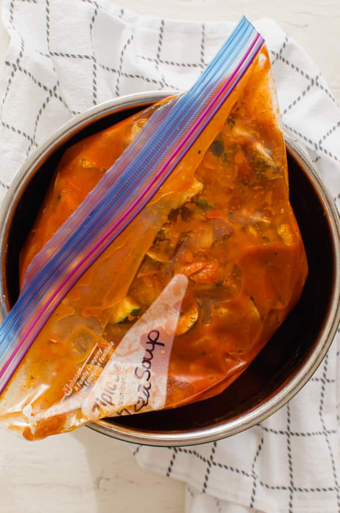Pizza soup in a freezer bag, being prepped for an Instant Pot freezer meal