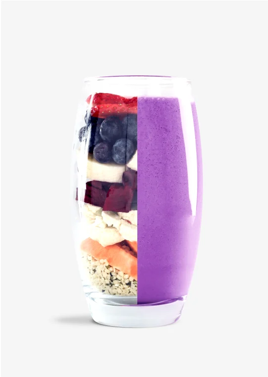 Stock photo of Berry smoothie from SmoothieBox showing ingredients on one side and blended smoothie on the other side.