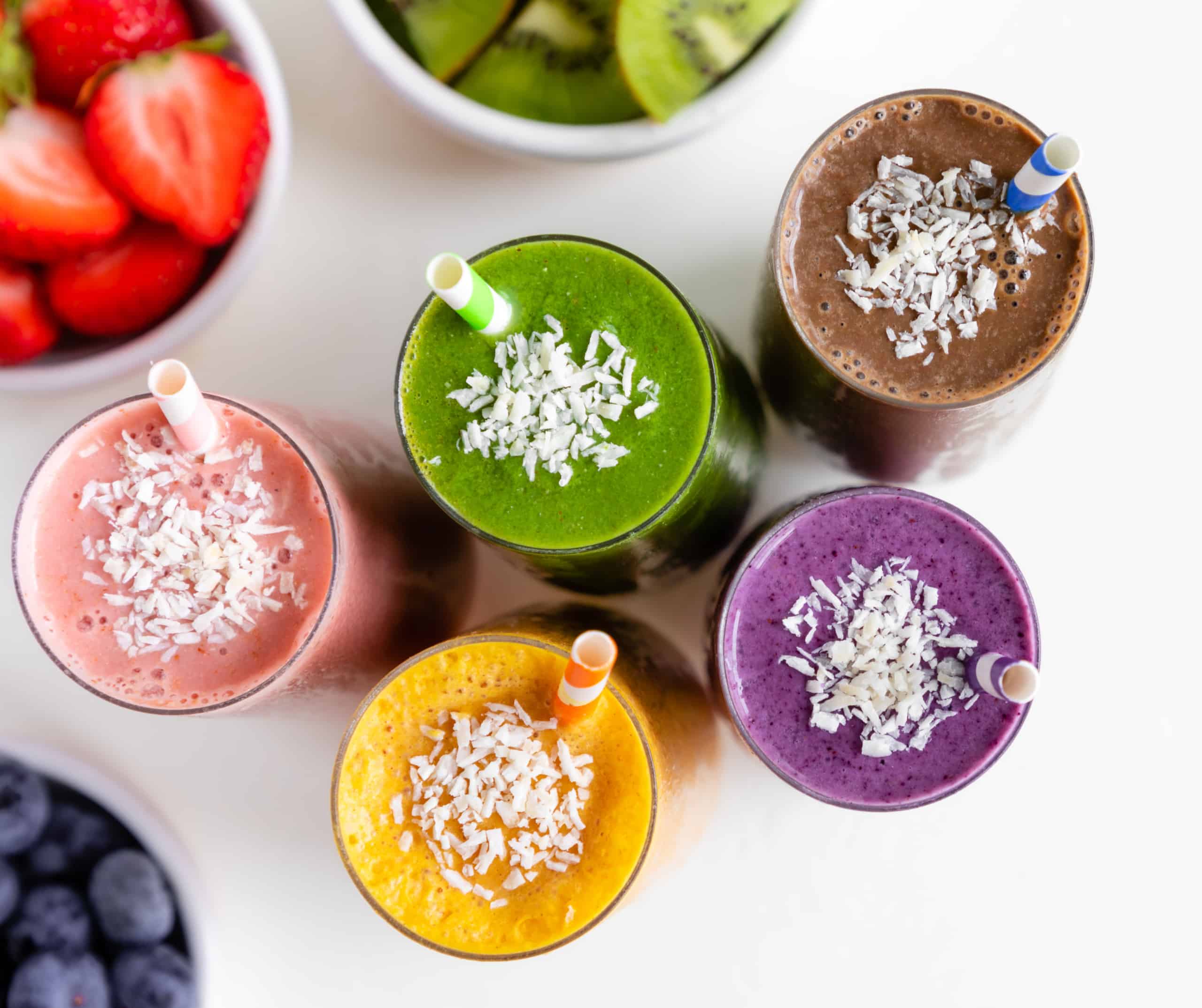 Five smoothies in glasses representing each of the flavors from SmoothieBox.