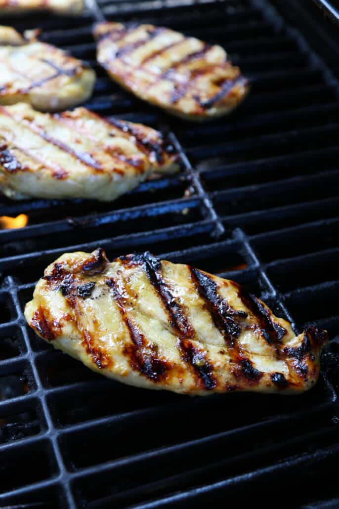 marinated honey mustard chicken breasts on on the grill
