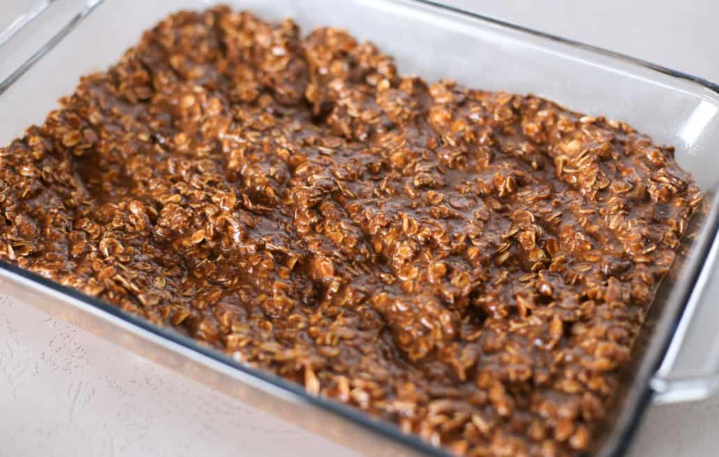 chocolate oatmeal batter in a glass dish