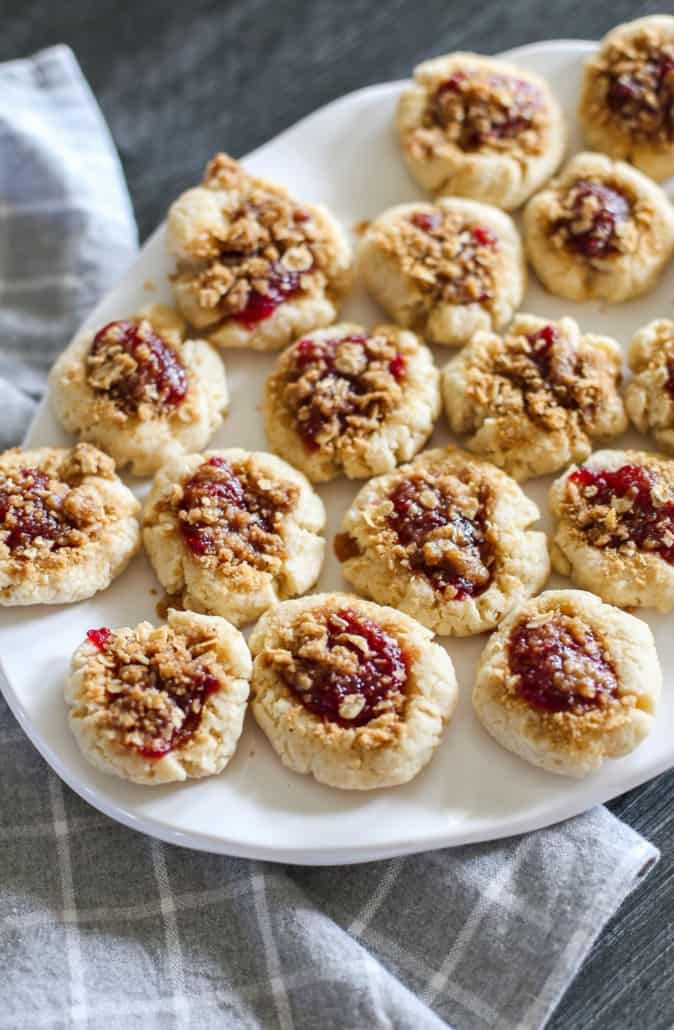 Raspberry crumble cookies on a white plate