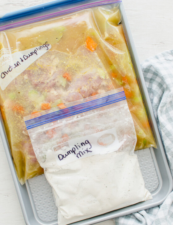 Chicken and Dumplings packaged as a freezer meal with dumpling mix in one baggie and all the rest of the ingredients in a gallon-size freezer bag.