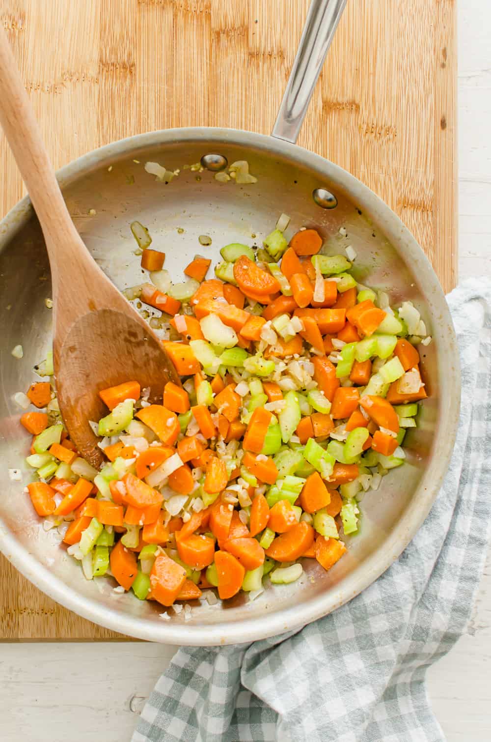 Carrots, celery, onion, and garlic in saute pan.