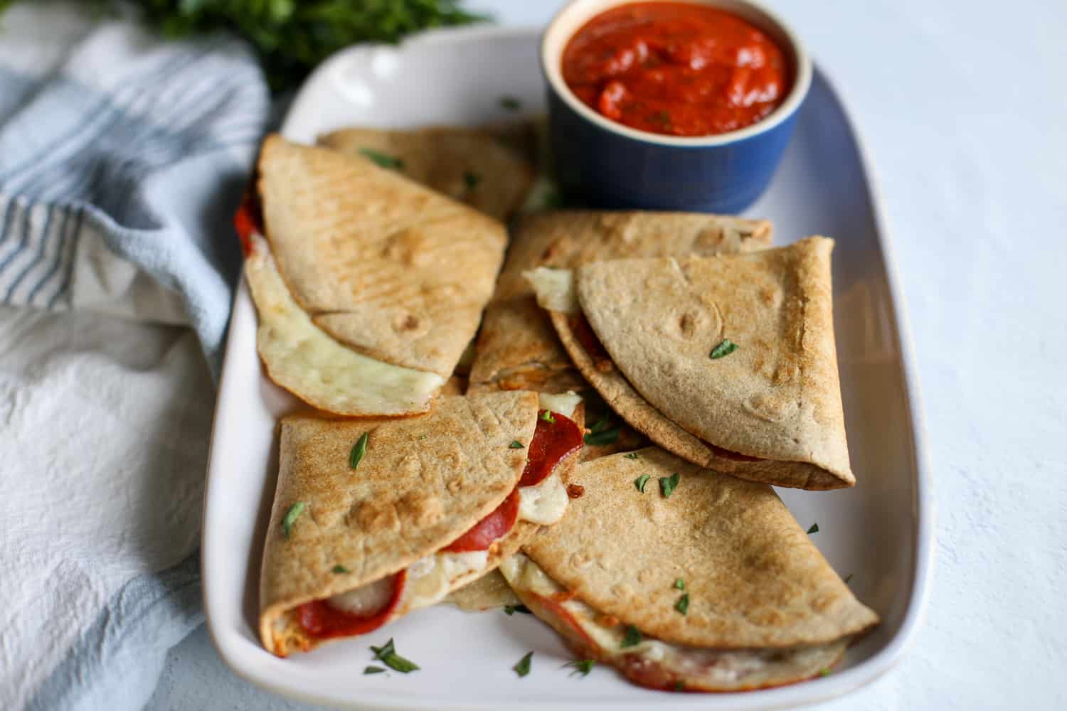 Our 14” Lodge Pizza Pan. We've had this for almost 20 years. It's the first  pan our sons learned to cook on as kids —grilled cheese, quesadillas, pizza,  pancakes, French toast, omelettes