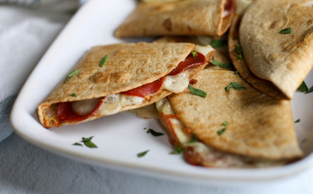 pizza quesadillas cut up on a platter