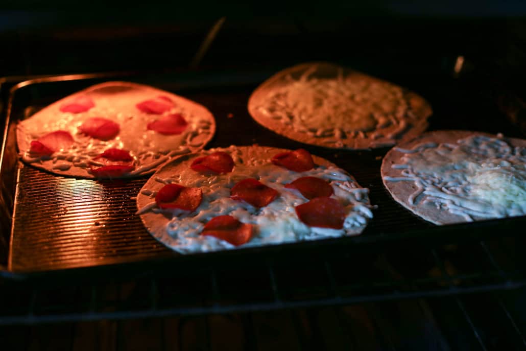 pizza quesadillas cooking in the oven