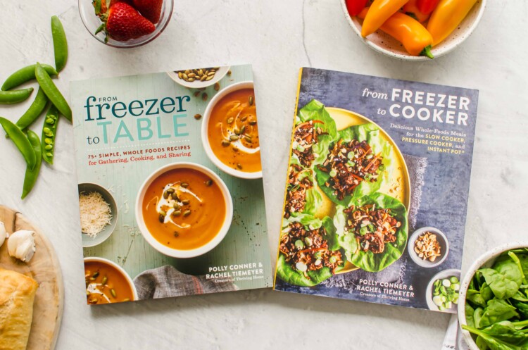 From Freezer to Cooker and From Freezer to Table cookbooks side by side.