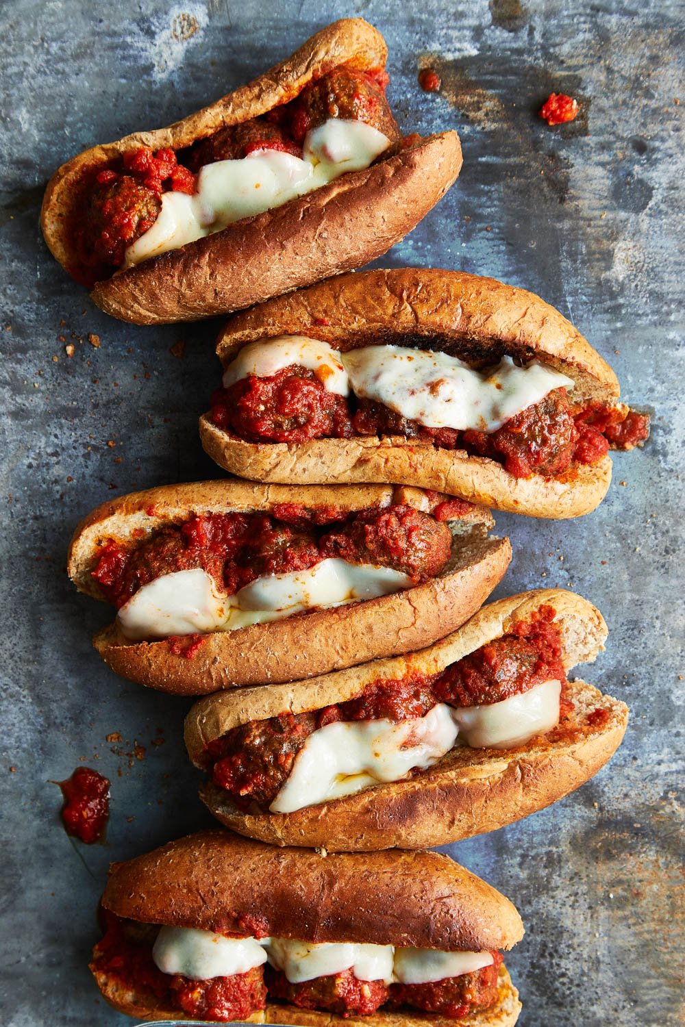 Easy homemade meatball sub sandwiches side by side.