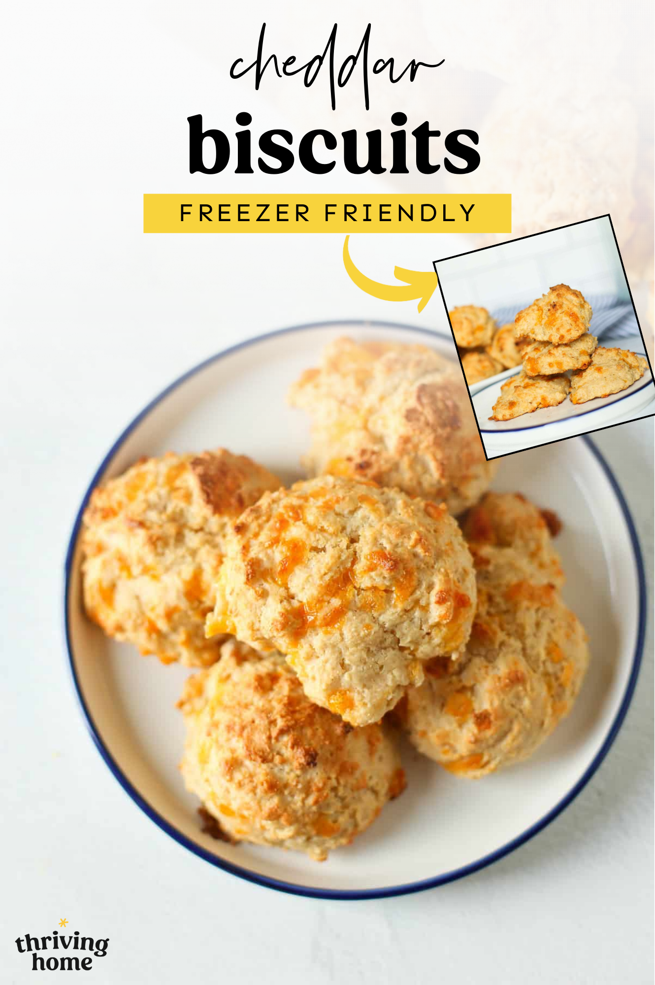 Cheddar biscuits stacked in a pyramid on a plate.