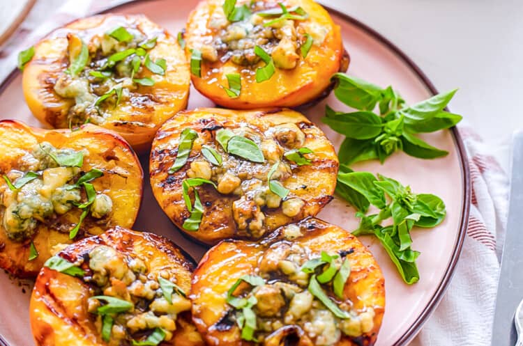 grilled peaches on a plate