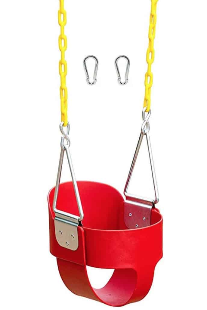 Red toddler swing hanging from plastic coated chain.