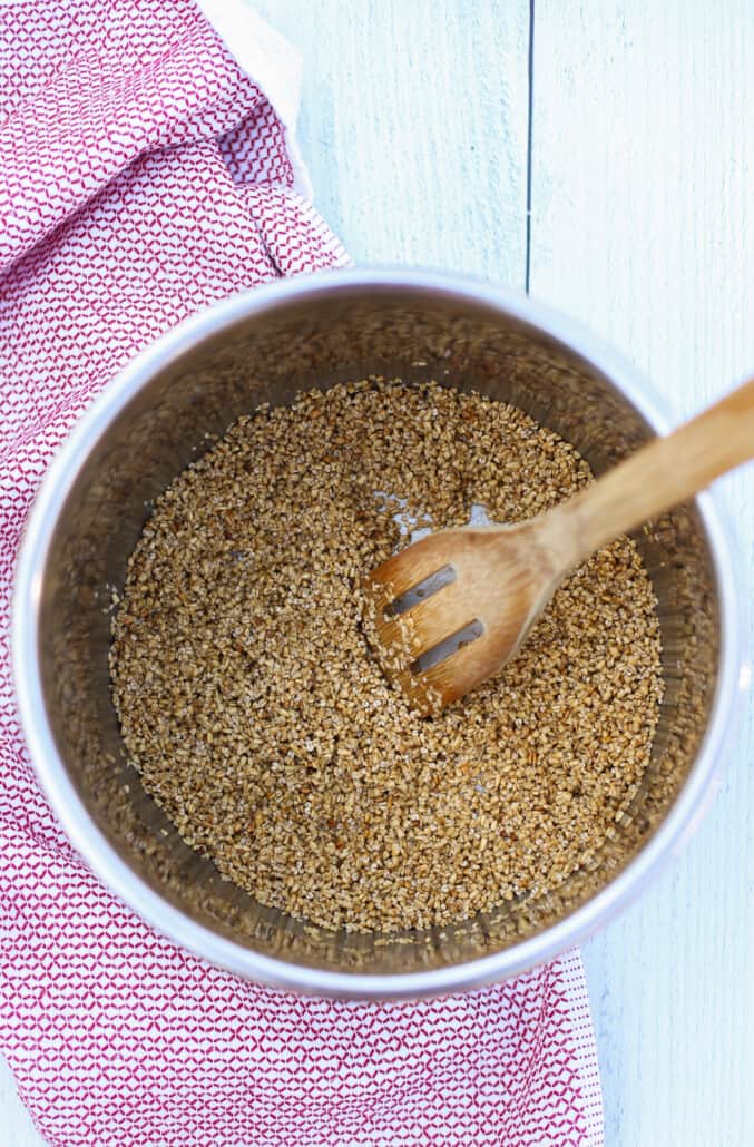 steel cut oats being toasted in instant pot