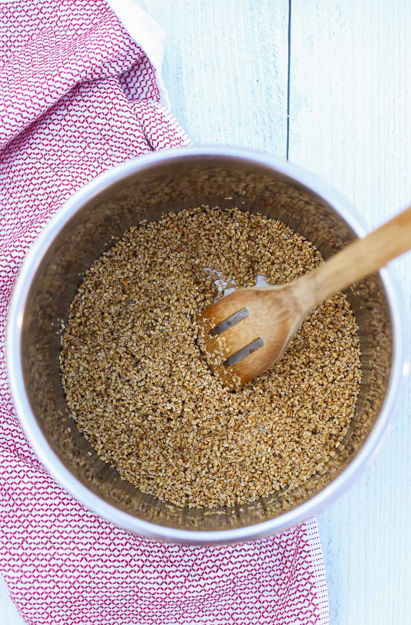 steel cut oats being toasted in instant pot